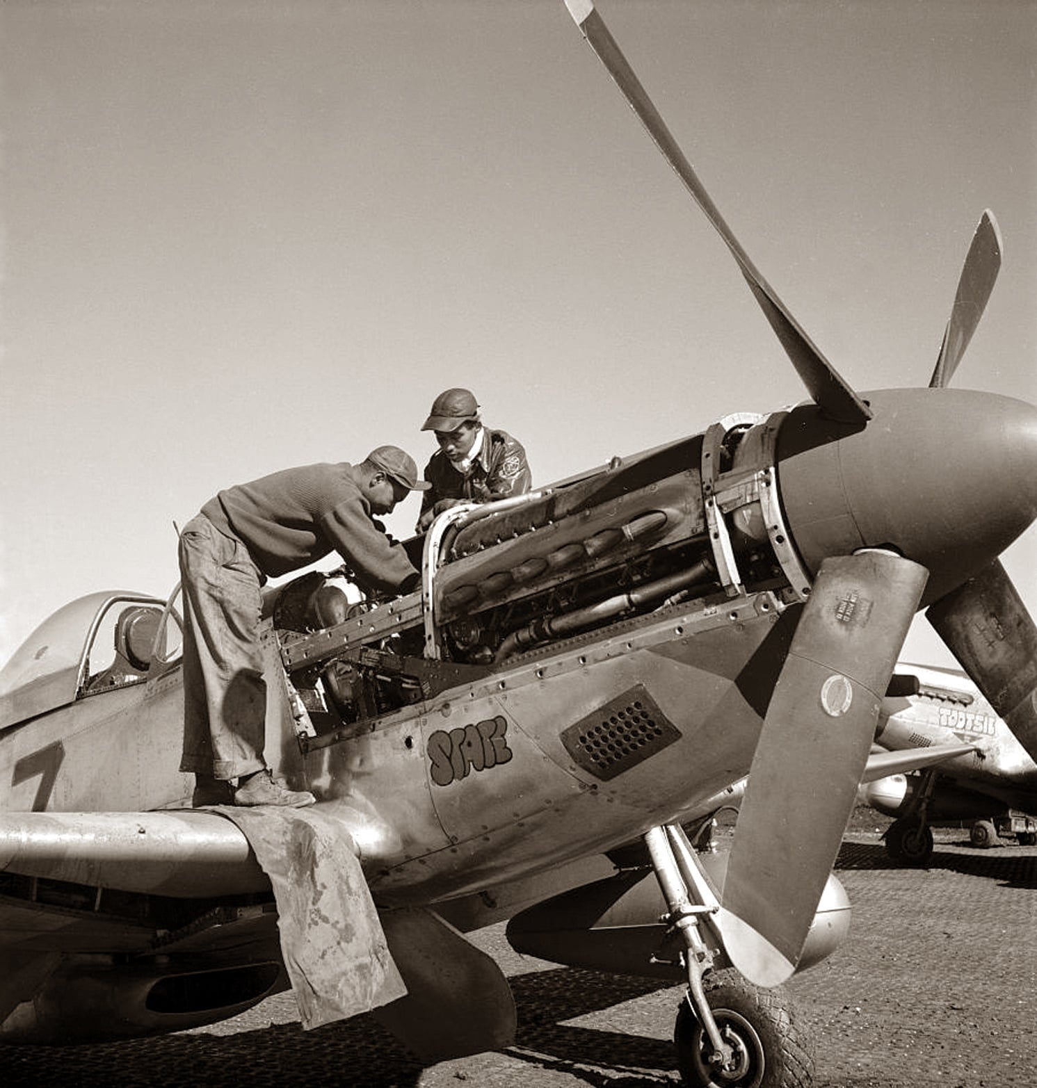 Maintenance on P-51 Mustang, Italy, 1945